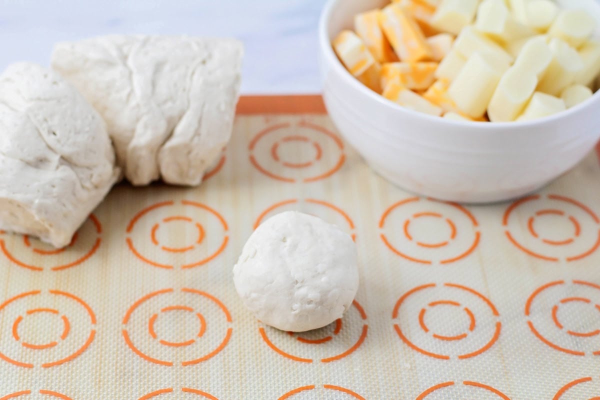 A dough ball on a silpat mat.