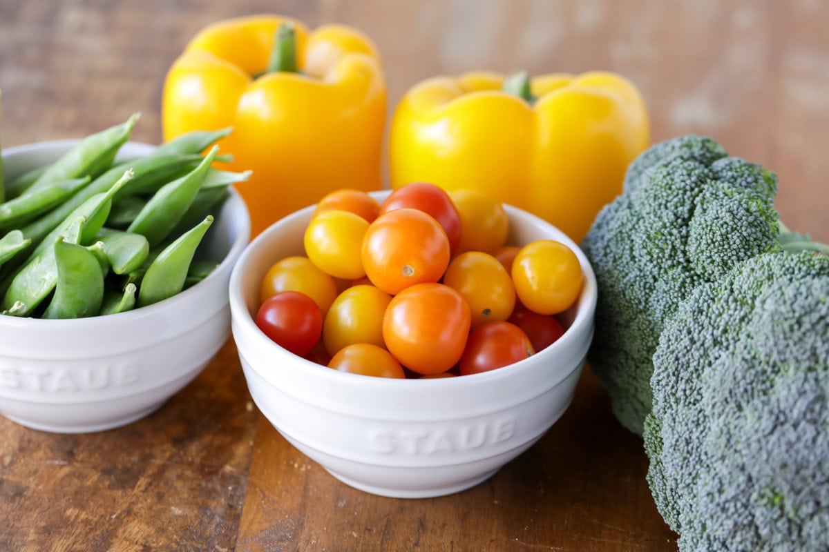 Ingredients for Christmas veggie tray in white bowls.