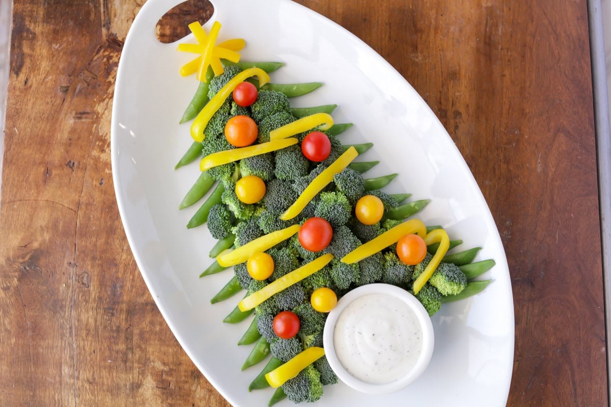 A Christmas Tree Veggie Platter on the counter.