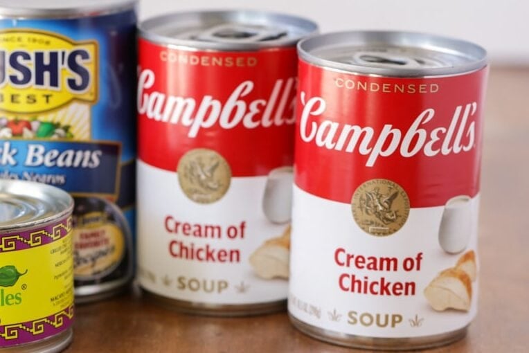 Photo of canned whole kernel sweet corn, diced green chiles, black beans, and 2 cans of cream of chicken soup. 