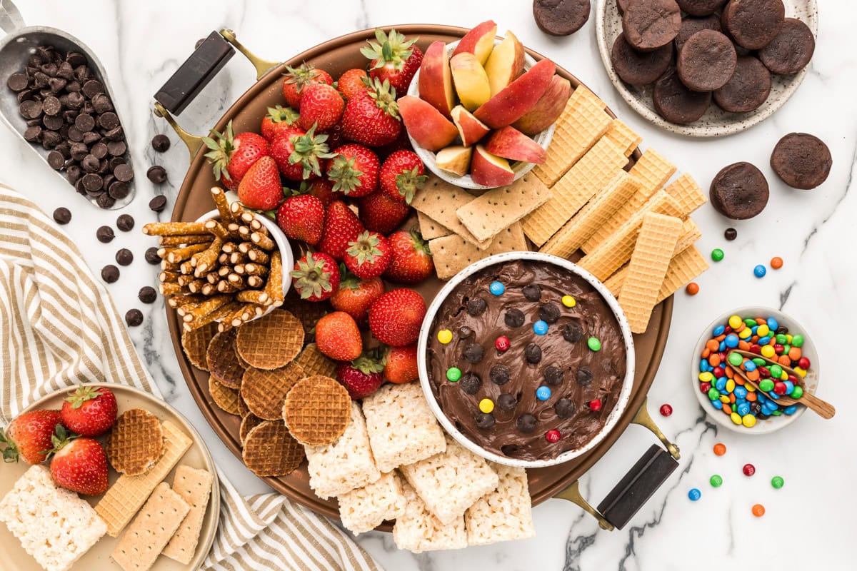 A dessert charcuterie board filled wtih sweets.