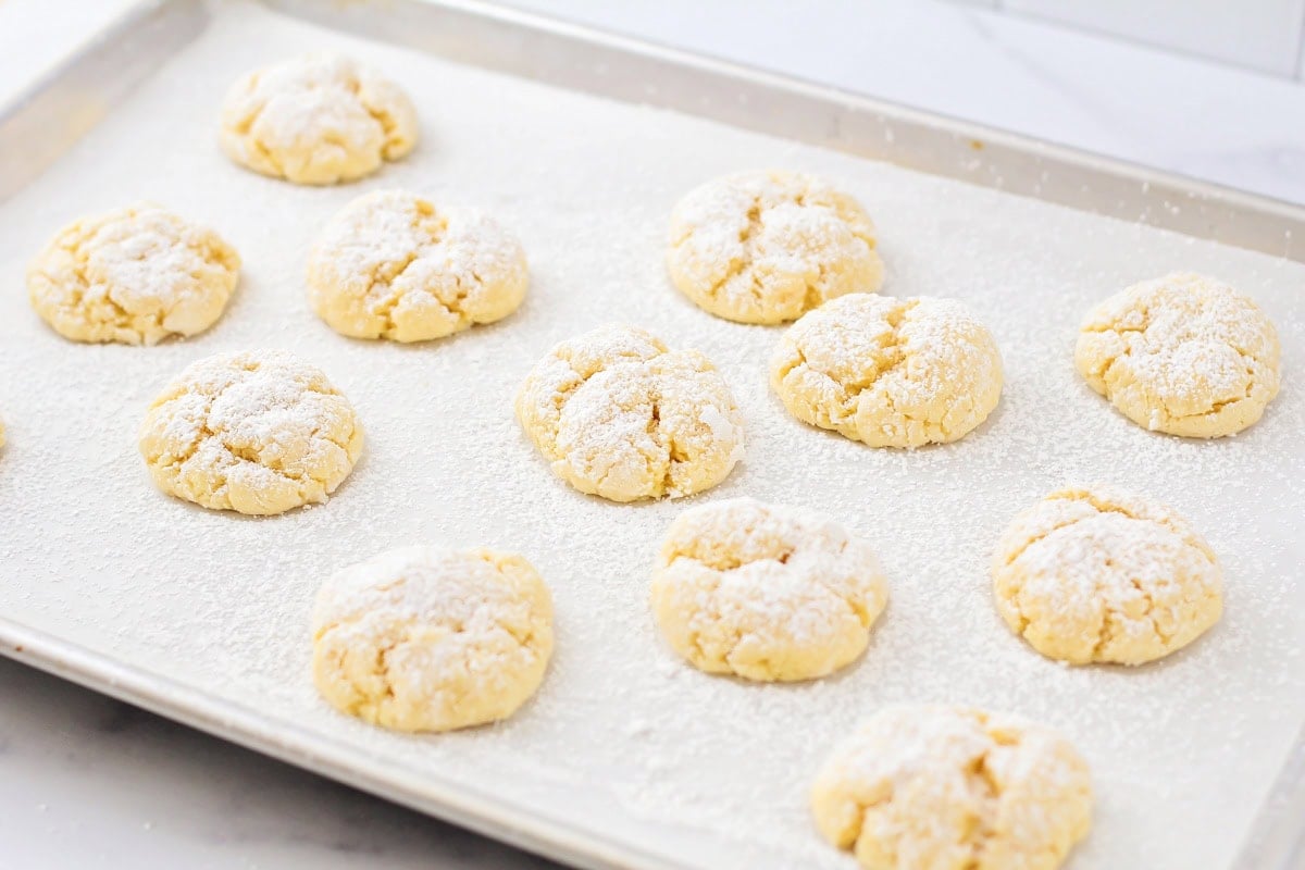 Gooey butter cookies sprinkled with powdered sugar.