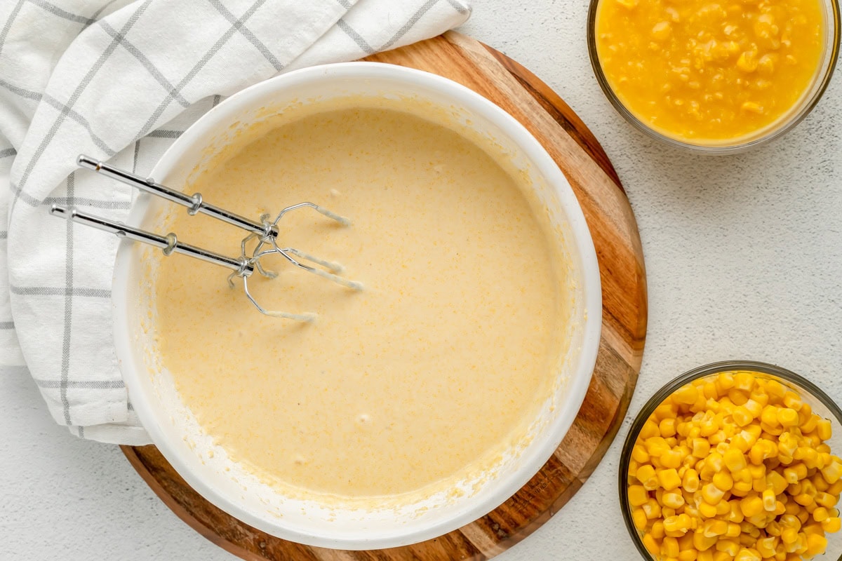 Jiffy corn pudding batter mixed in bowl.