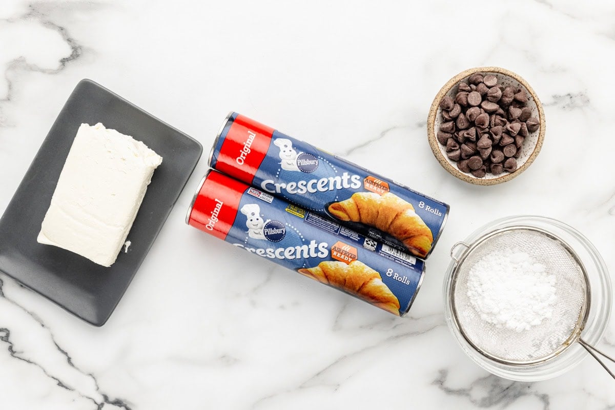 Ingredients for crescent roll dessert on a kitchen counter.