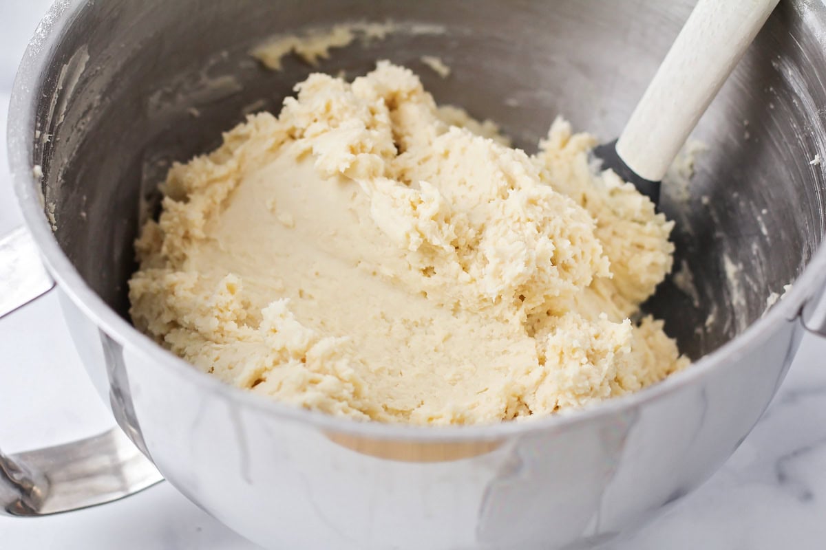 Cookie batter in a mixing bowl.