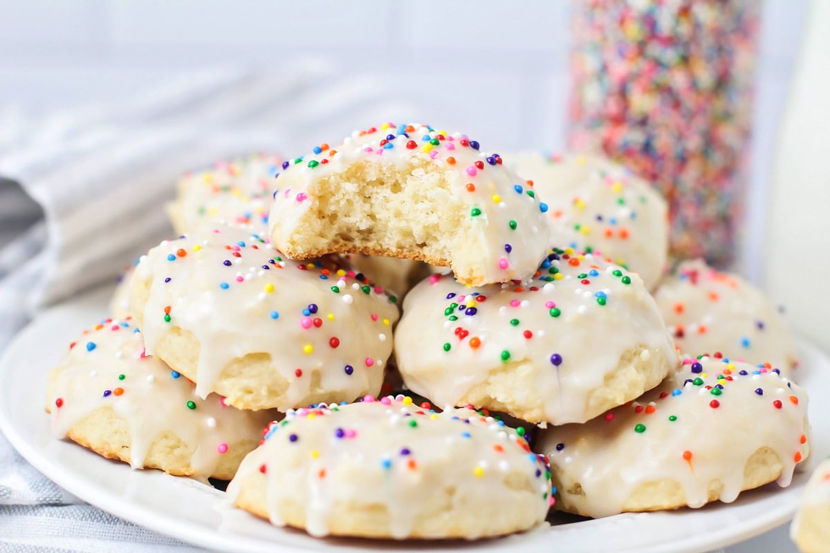 A plate filled with ricotta cookies.