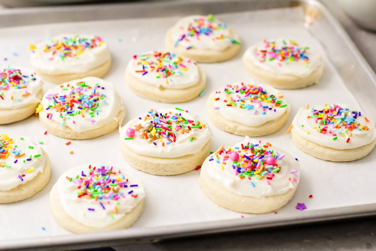 Sugar cookie frosting on cookies.