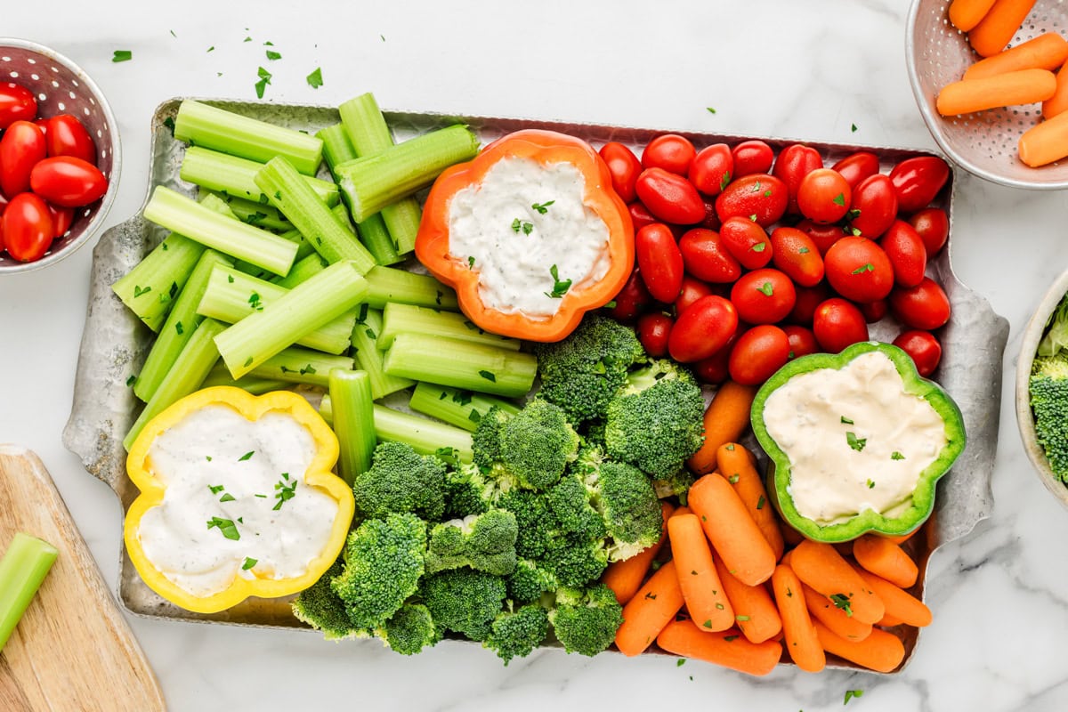 Homemade veggie tray put together with dips and veggies.