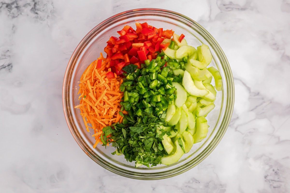 Chopped veggies in a glass bowl.