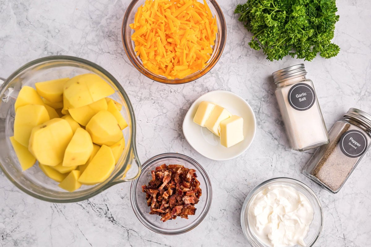 Ingredients for baked mashed potatoes on counter.