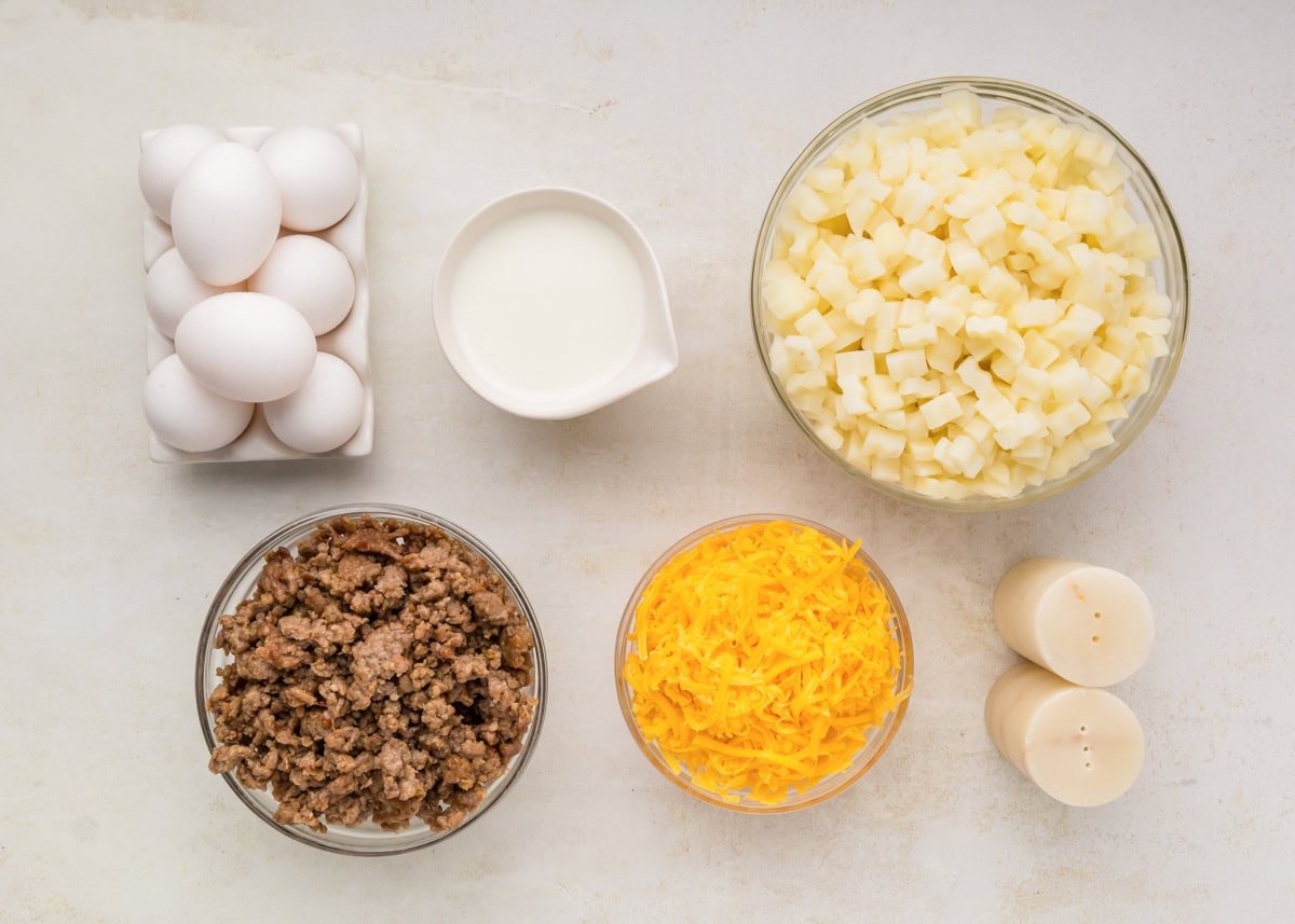 Ingredients for breakfast potato casserole on counter.