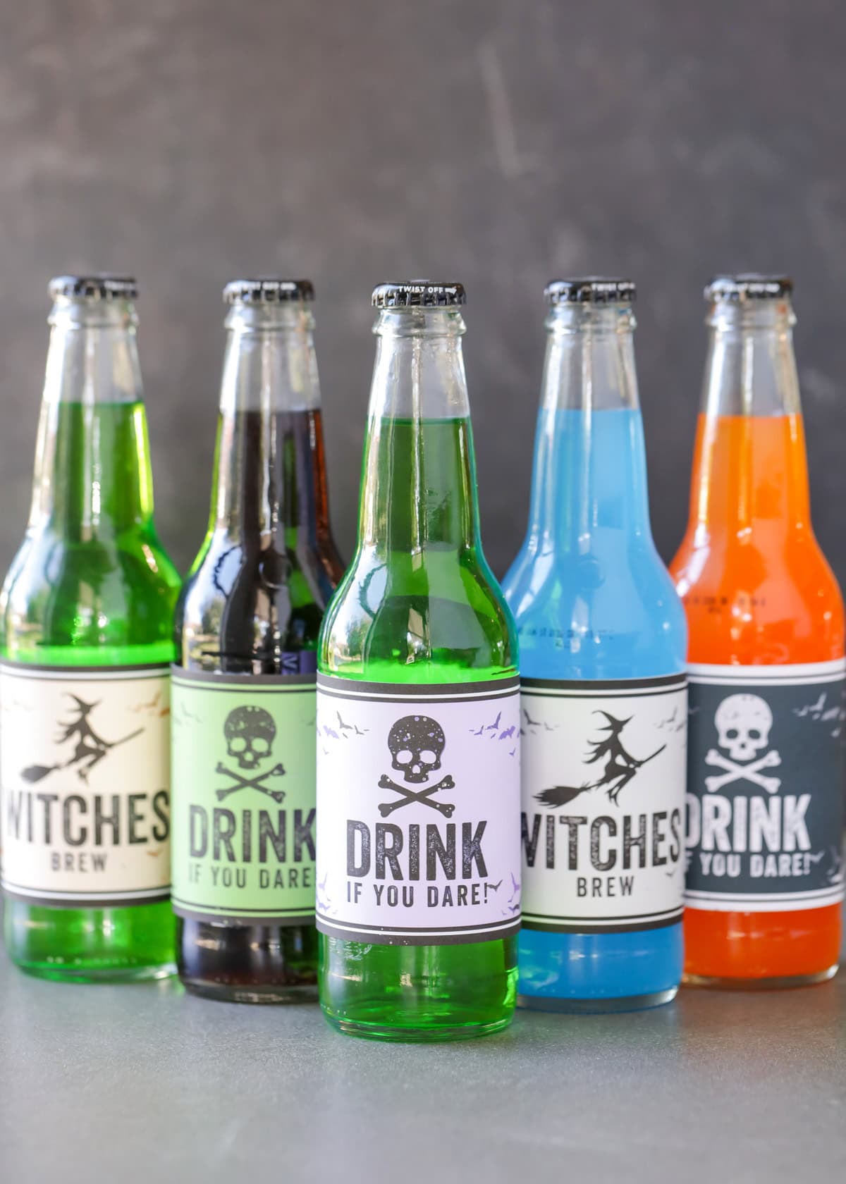 5 bottles of Jones soda with Halloween soda pop labels.