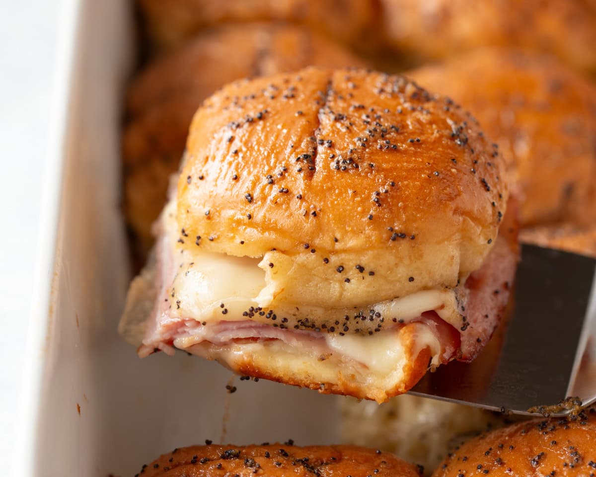 Ham and cheese slider recipe being served from baking dish.