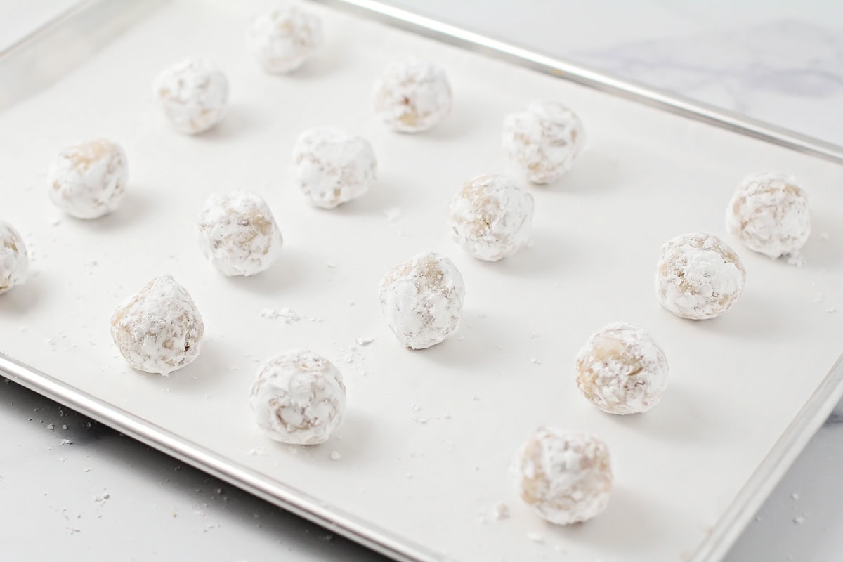 Dough balls rolled in powedered sugar.