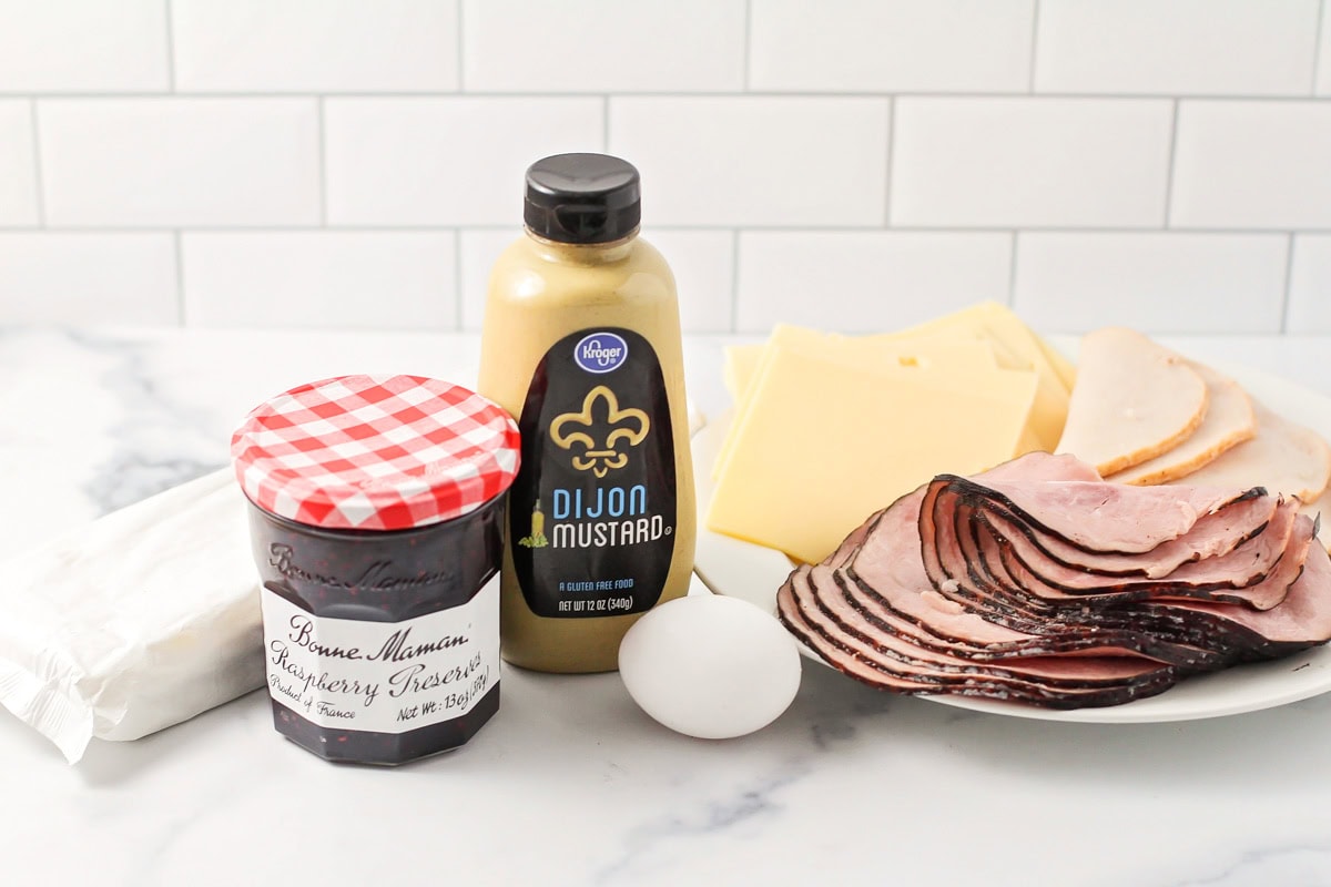 Ingredients for monte cristo pinwheels on a kitchen counter.