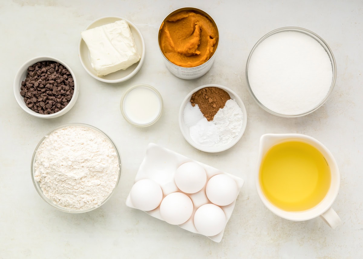 Ingredients for pumpkin cream cheese bars on counter.