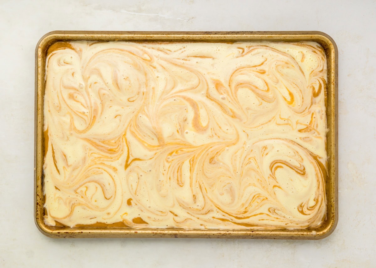 Pumpkin and cream cheese mixtures swirled together in bars.