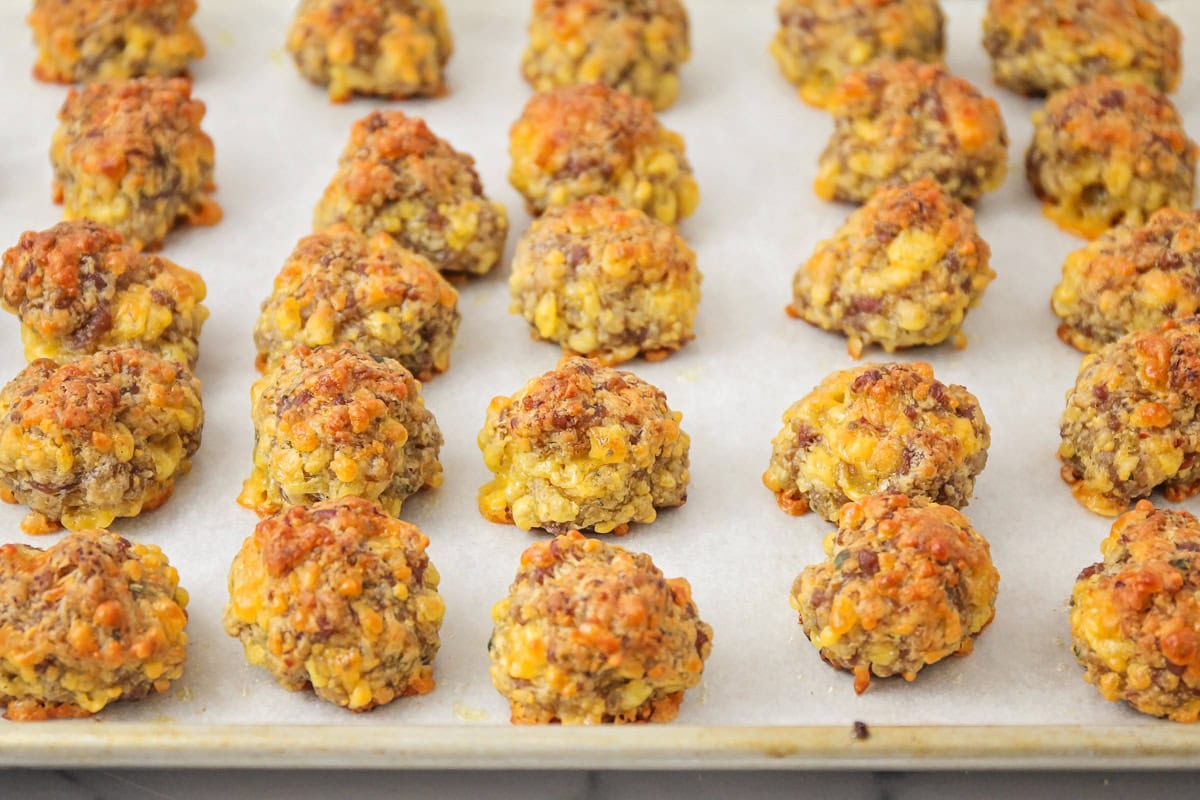 Bisquick sausage balls baked on cookie sheet. 