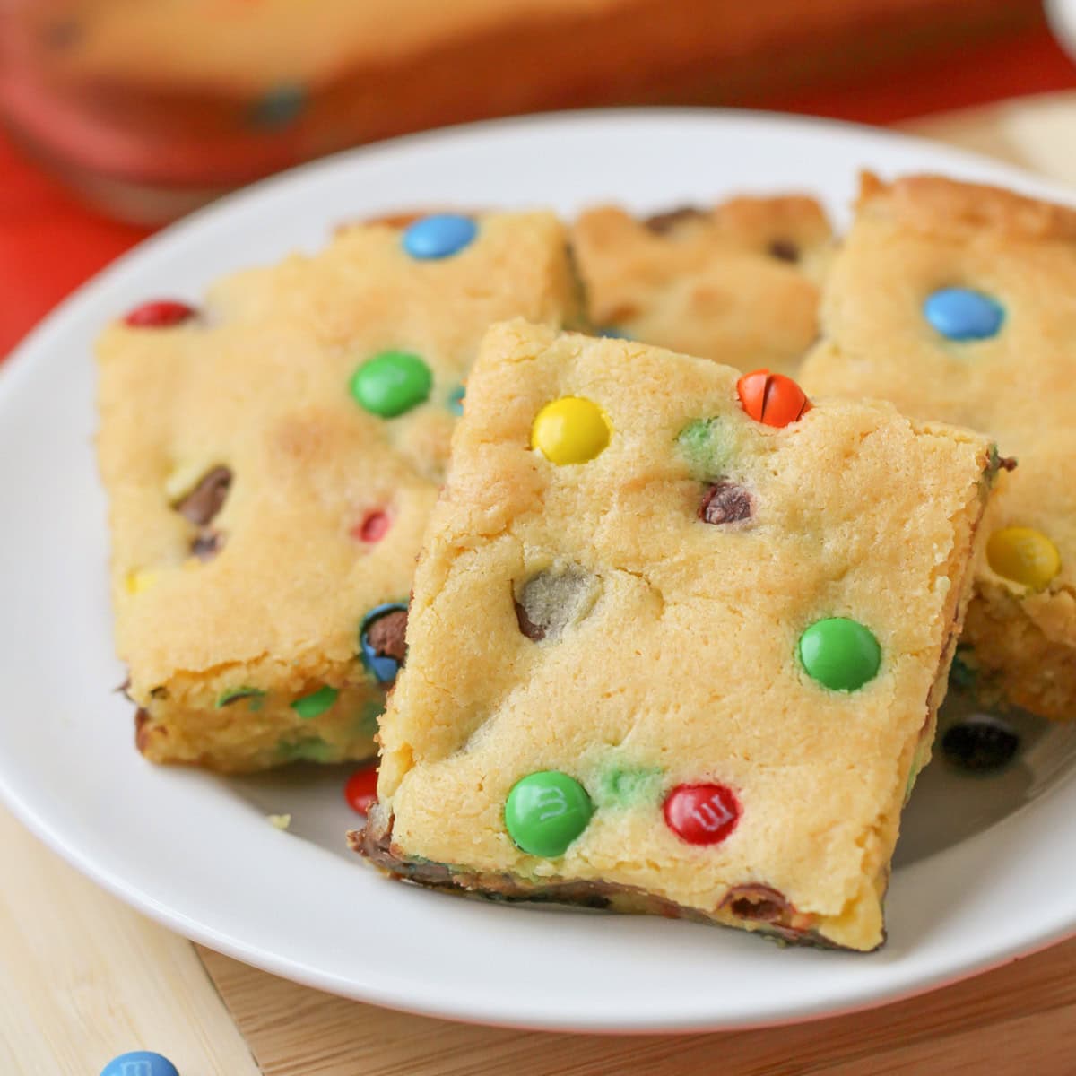 Close up image of cake mix cookie bars on white plate.