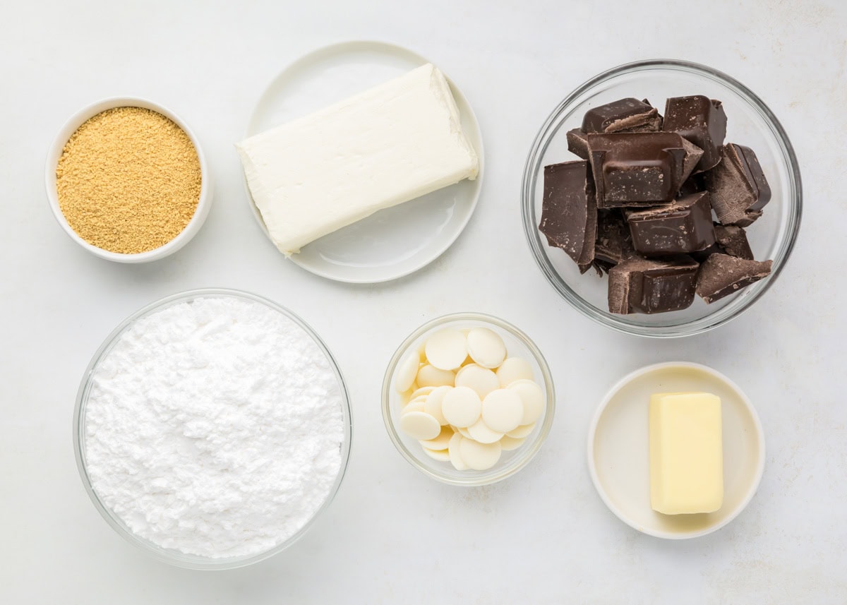 Ingredients for cheesecake bites on counter.