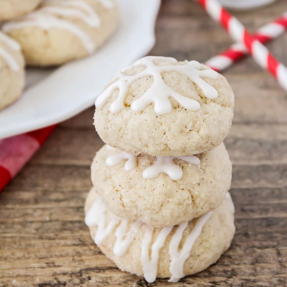 Eggnog snickerdoodles stacked on top of each other.