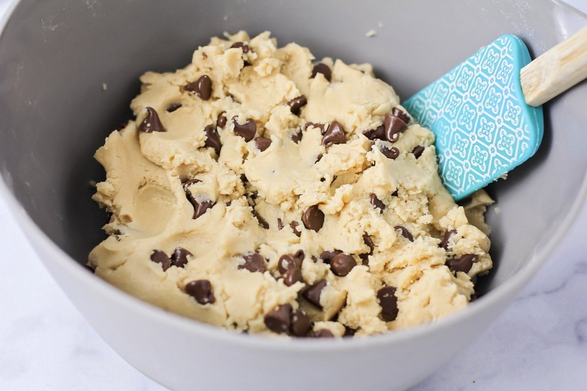 Pizookie cookie dough mixed together in mixing bowl.