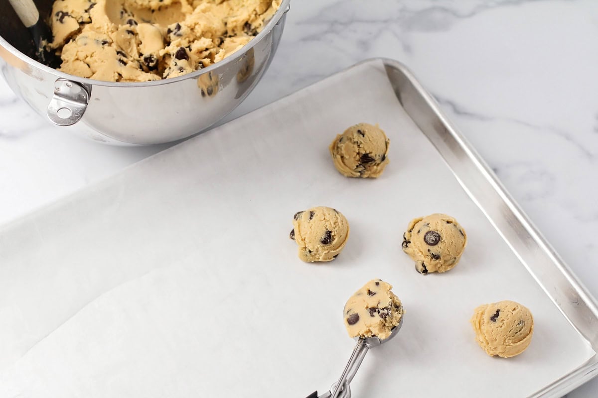 Scoop cookie dough on a lined baking sheet.