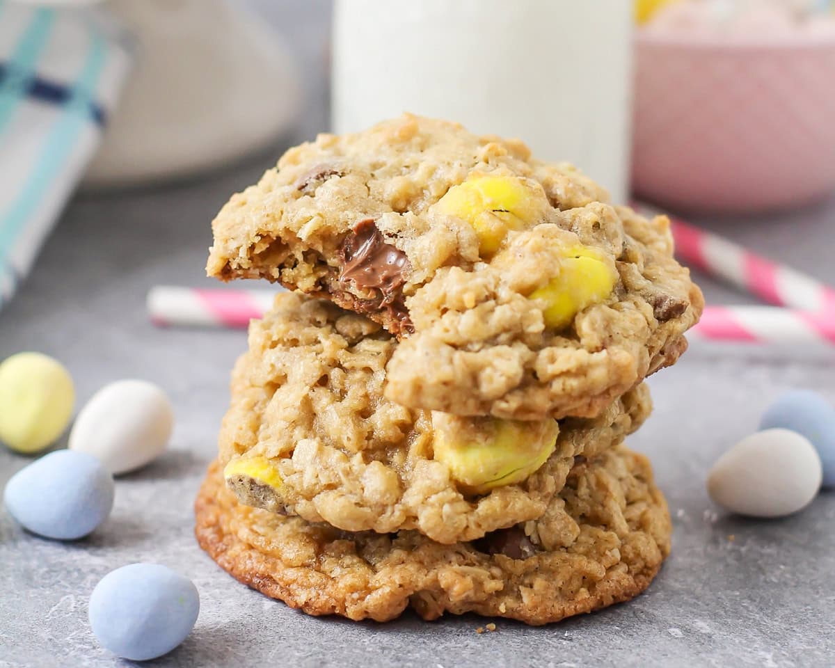 A stack of cadbury egg cookies on a kitchen table.