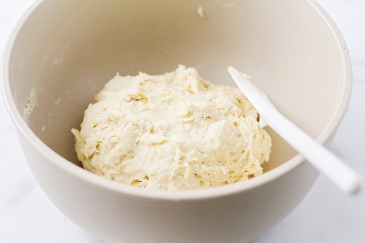 Calzone dough in mixing bowl.