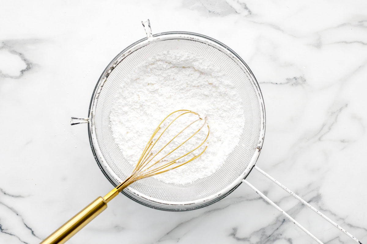 Powdered sugar for cinnamon roll icing recipe.