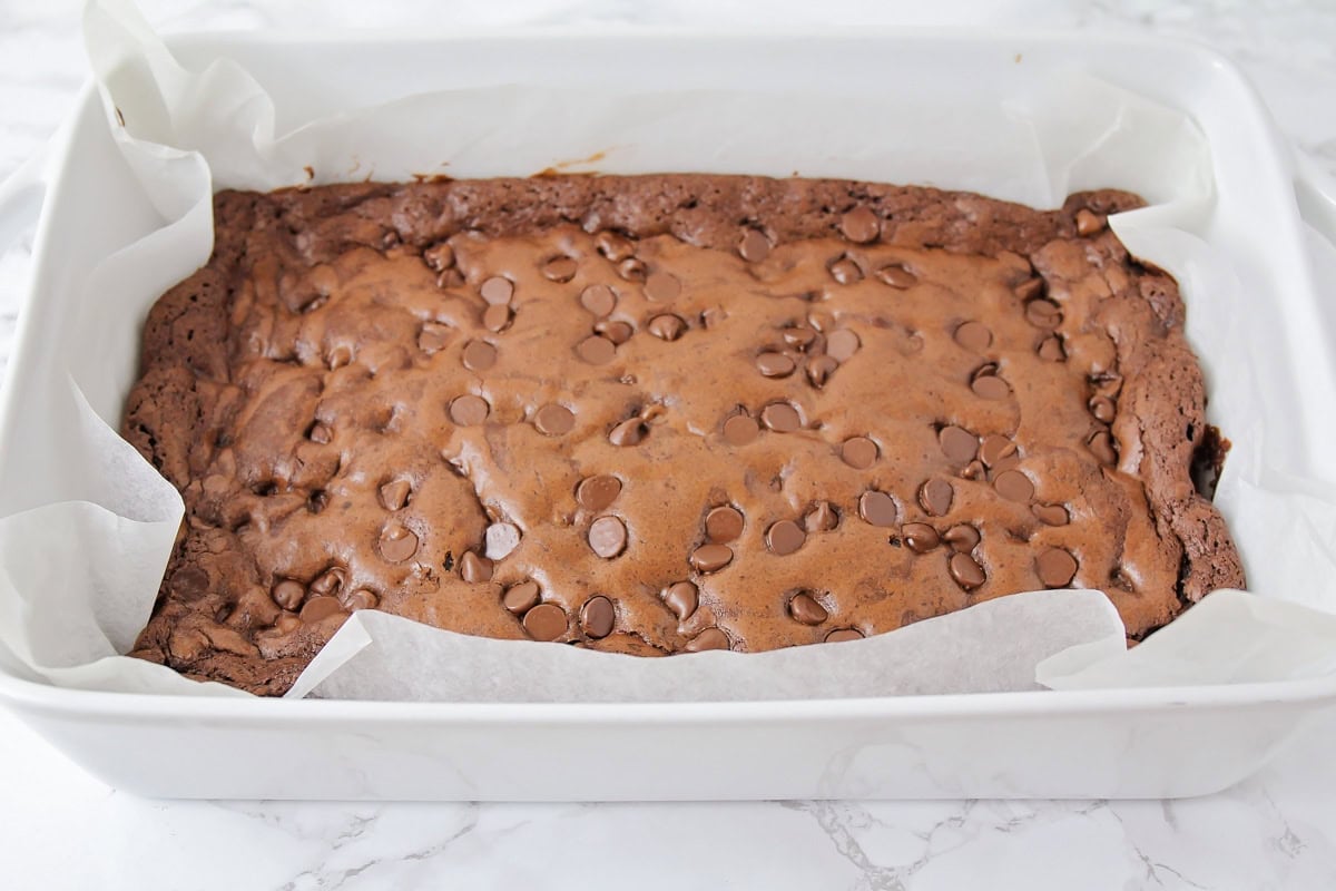 Homemade brownie recipe baked in baking dish.