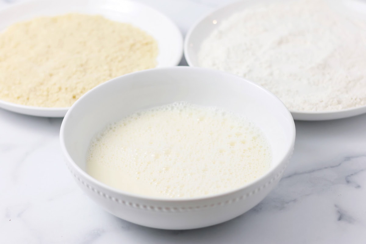 Bowls of milk, flour, and panko breadcrumbs.