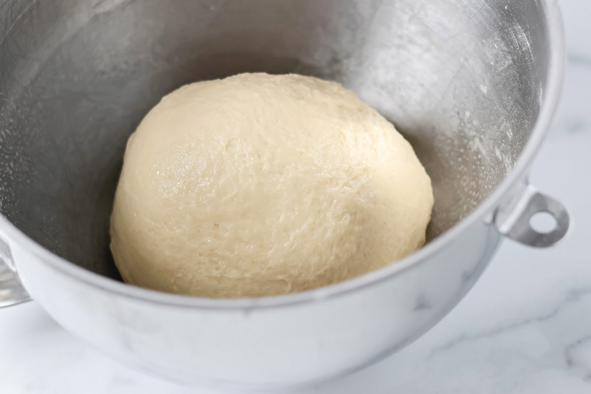 Mixing bowl with dough ball.