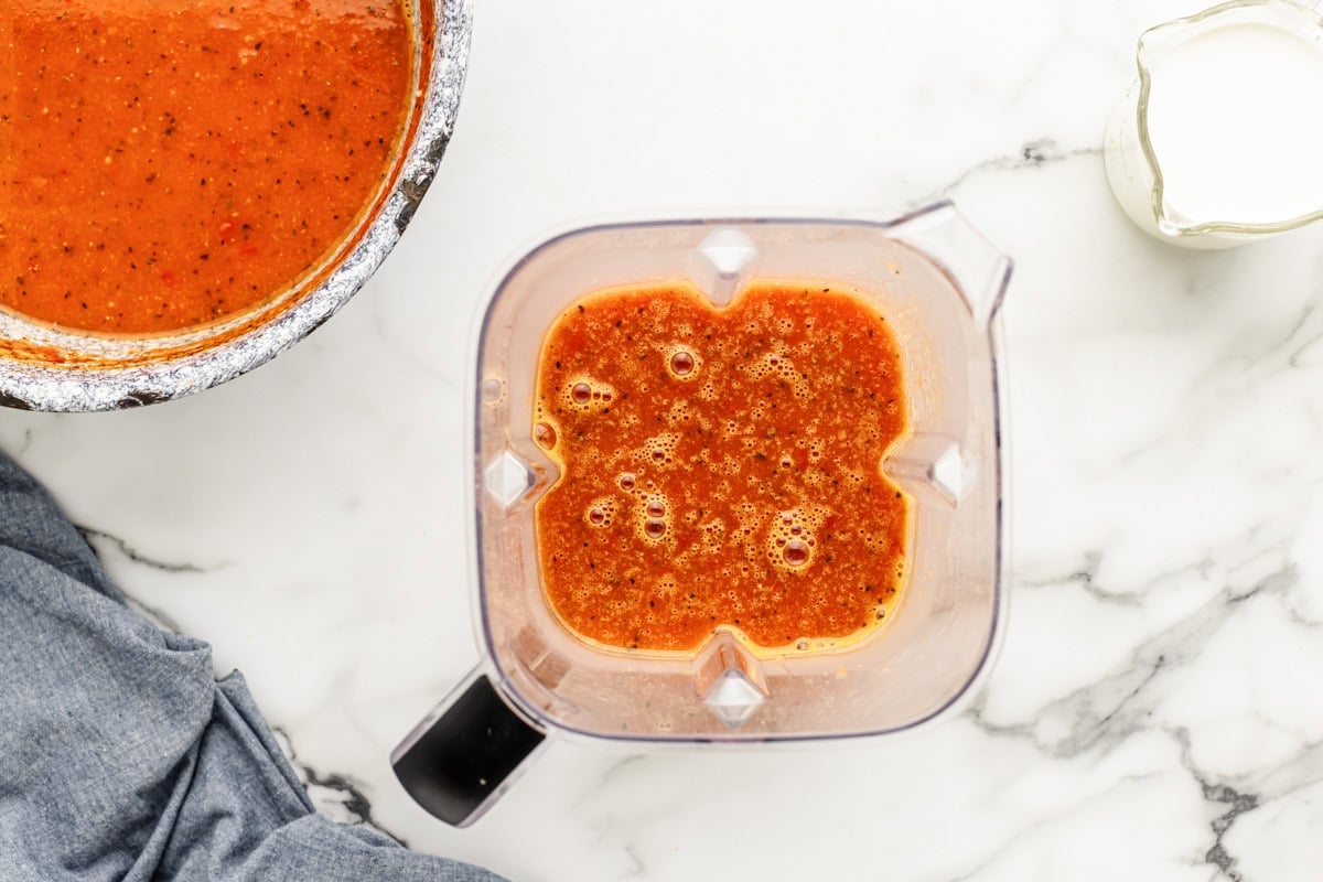 Thick, creamy, and delicious tomato bisque is a family favorite. This homemade classic is on the table in only 20 minutes! Adding soup to a blender.