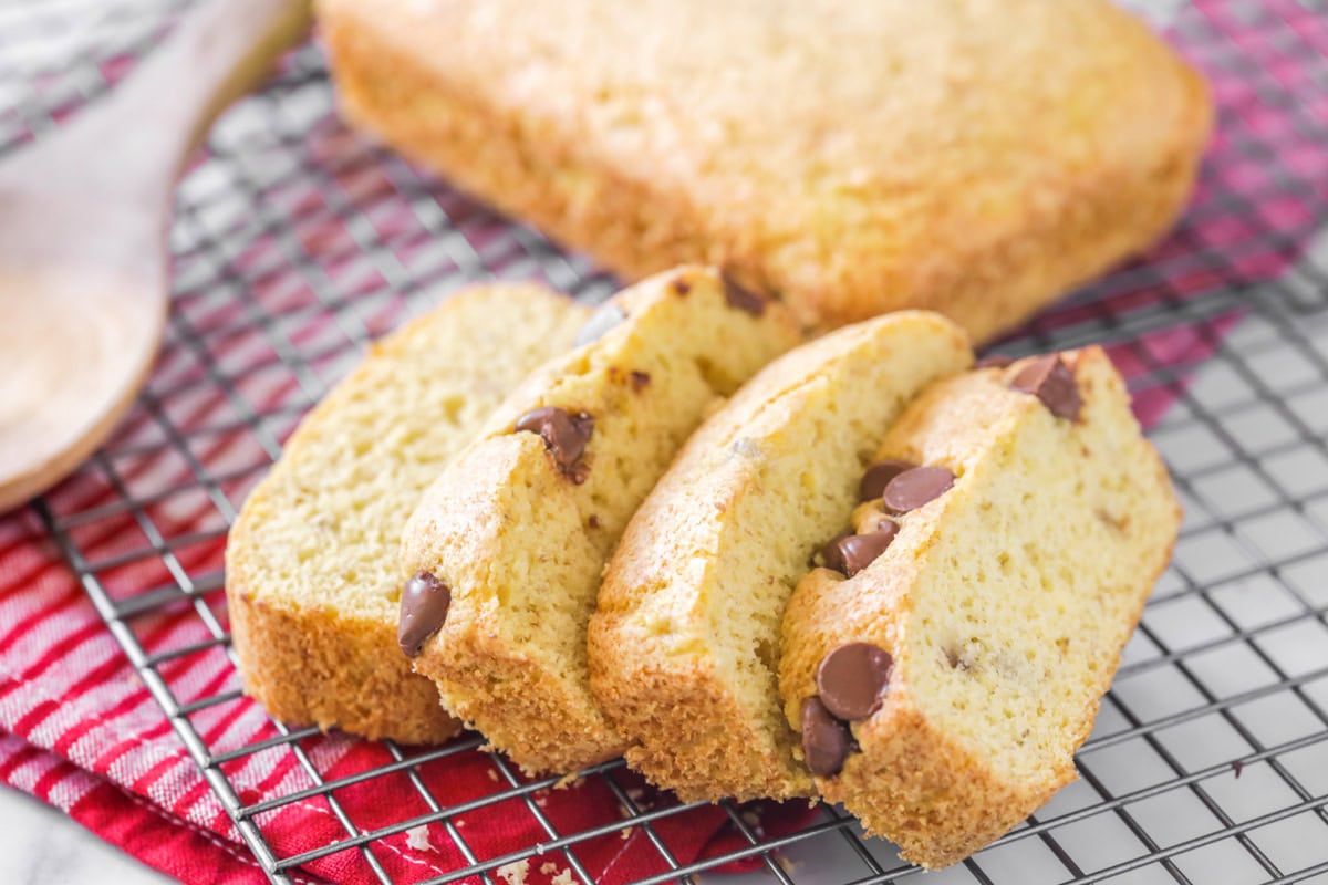 Slices of 3 ingredient banana bread recipe on wire rack.