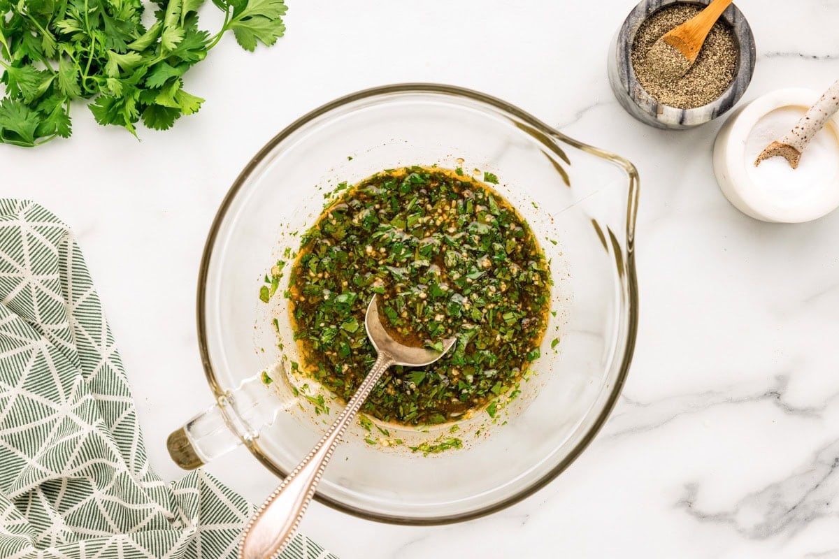 Marinade ingredients mixed in a glass bowl.