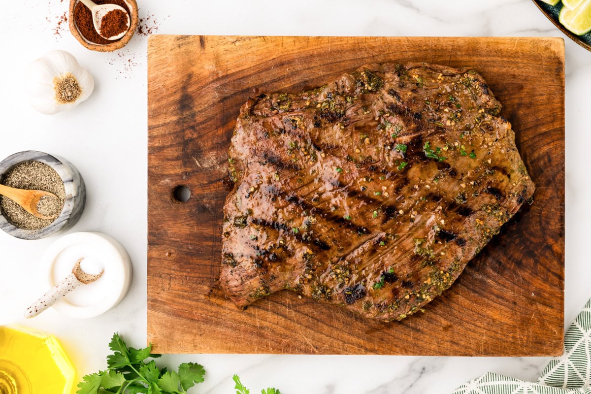 Carne asada on cutting board.