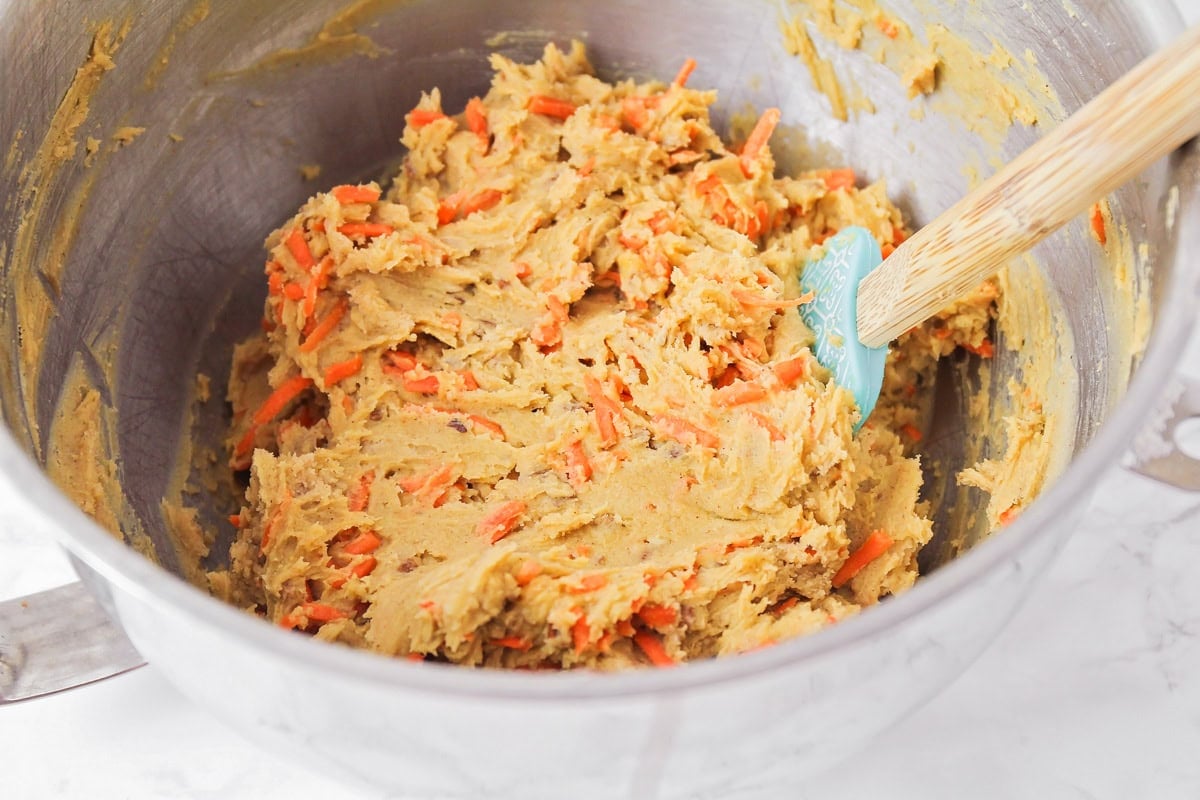 Carrot cake cookie dough in mixing bowl.