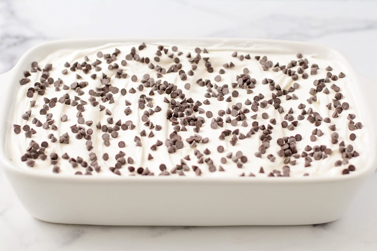 Chocolate chips sprinkled on top of the Cool Whip layer.