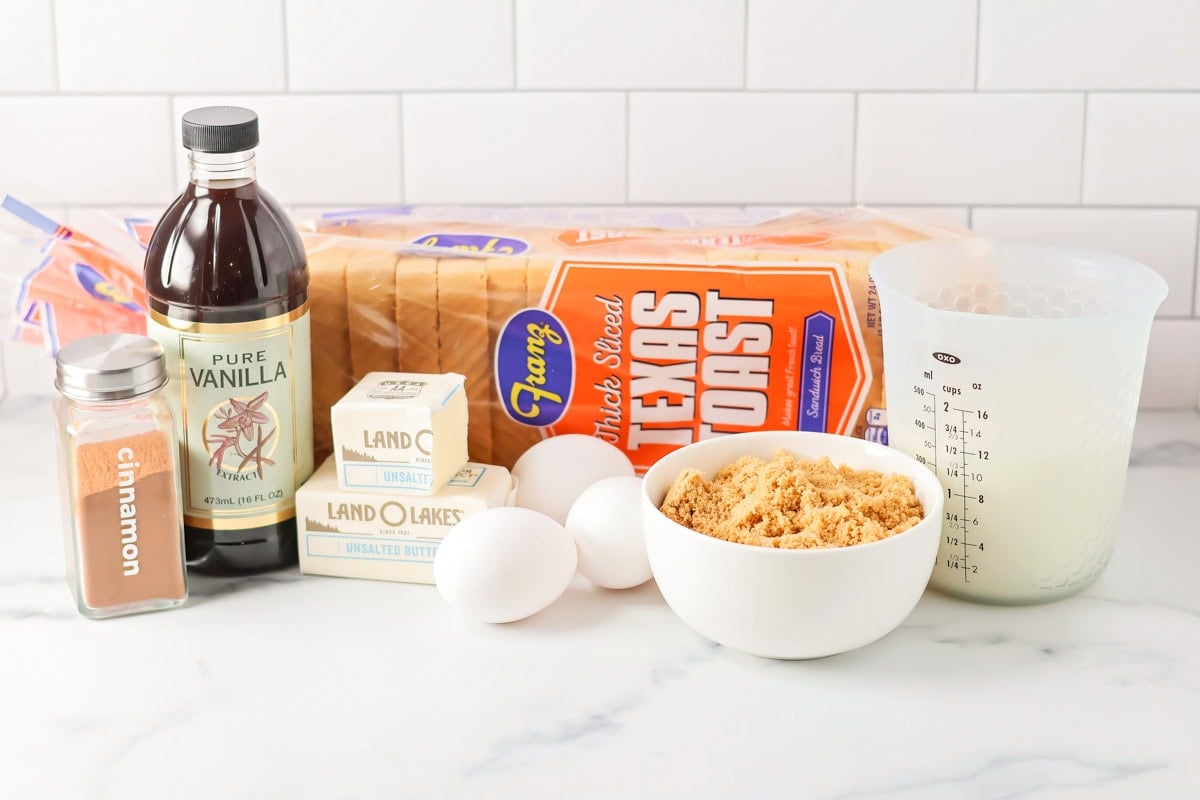 Cinnamon and brown sugar Texas toast French toast is a favorite make-ahead breakfast - chill overnight for an easy breezy morning! Texas toast, sugar, eggs, vanilla, and other ingredients on a kitchen counter.