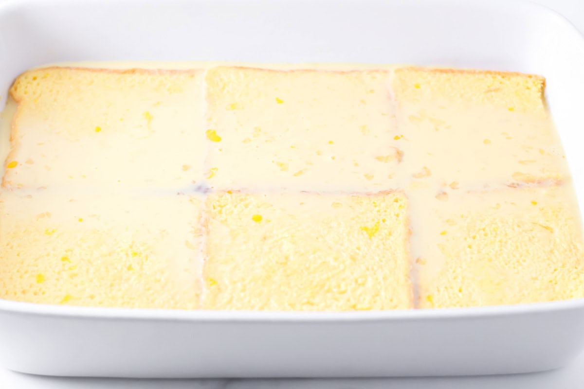 Egg soaked bread in a baking dish.