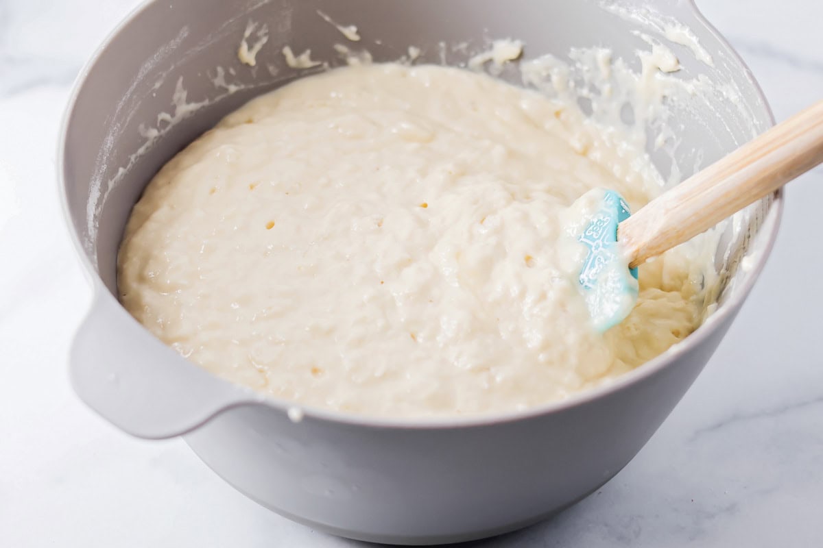 Our no-fail recipe for delicious, fluffy buttermilk waffles is morning perfection every time - guaranteed! Mixing buttermilk waffle batter.