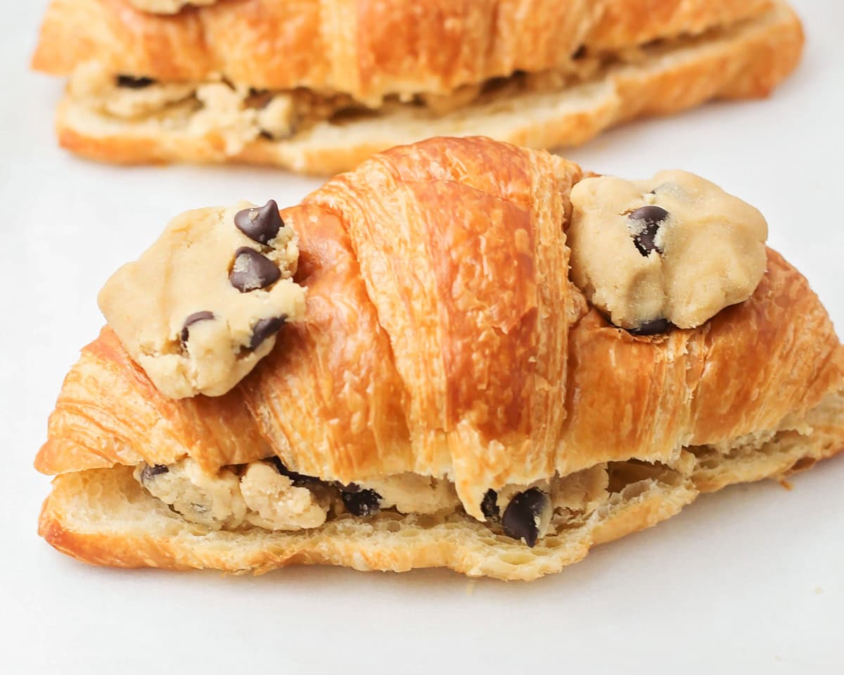 A filled cookie croissant ready to be baked.