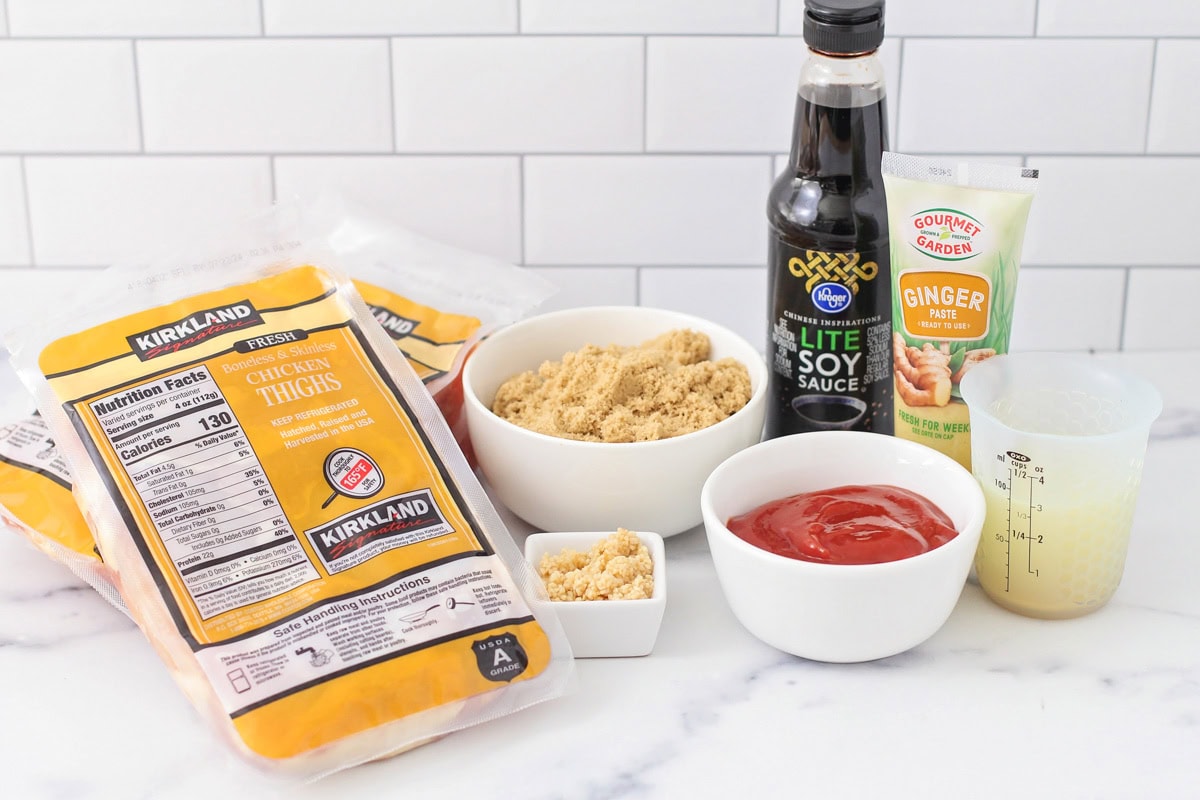 Grilled huli huli chicken is the juiciest and most delicious Hawaiian-style chicken you'll ever try! Serve it alone or on rice or noodles!! Various ingredients for Huli Huli chicken on a white countertop.