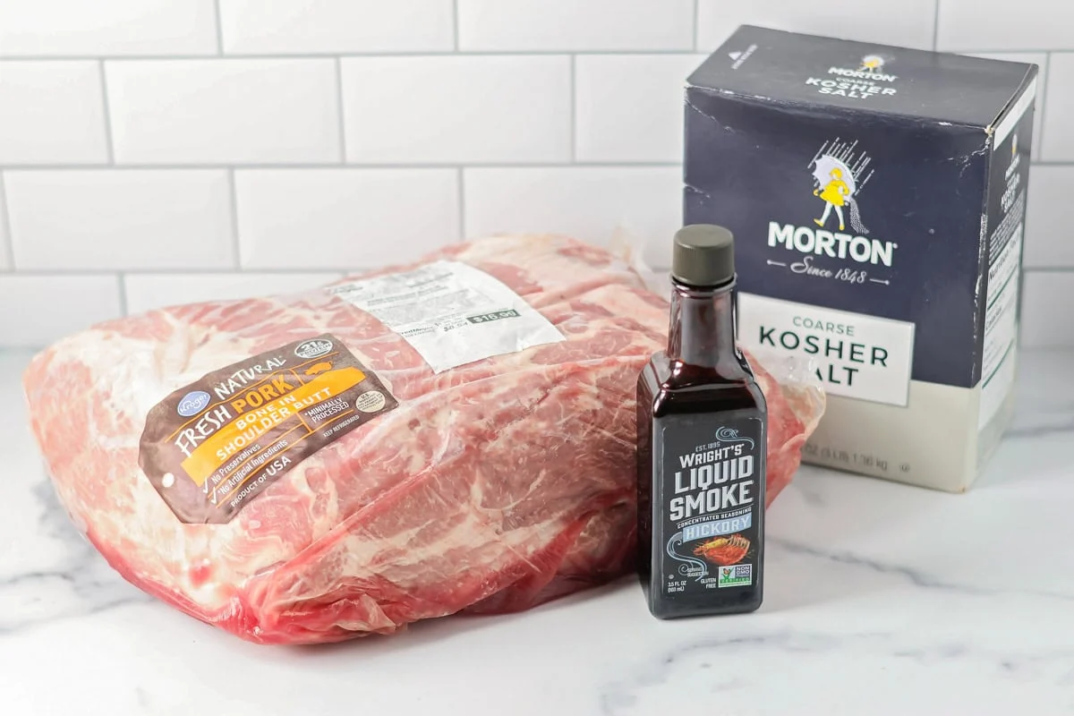 Ingredients for kalua pork recipe on a kitchen counter.