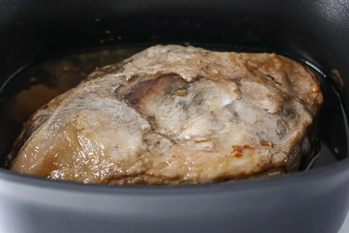 Kalua pork recipe in a slow cooker.