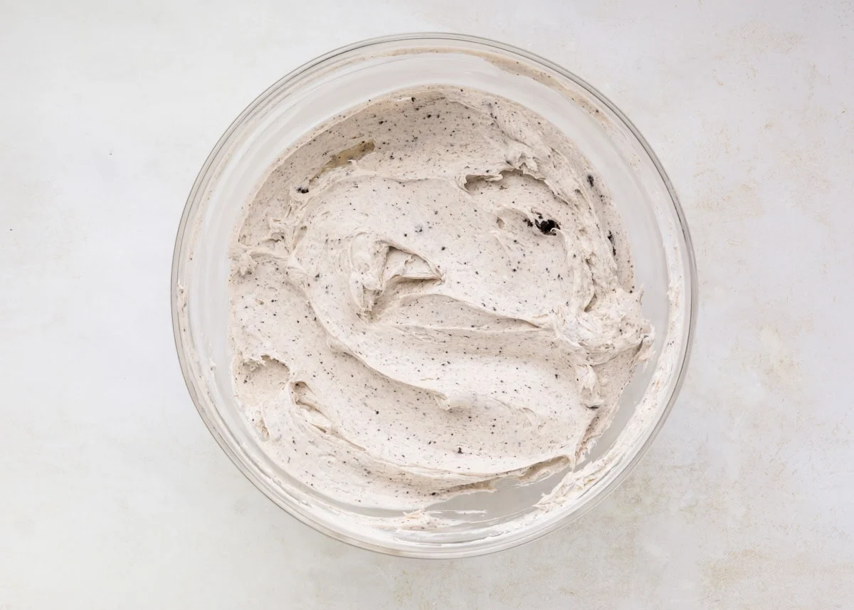 Whipped oreo mixture in a glass bowl.