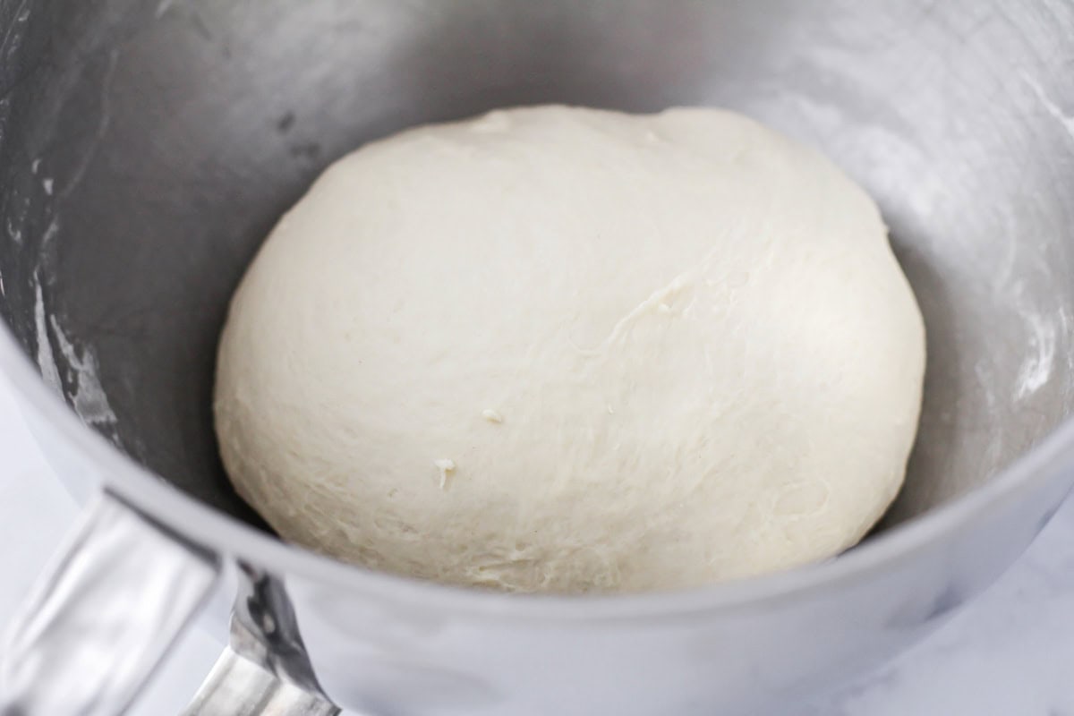 Dough ball in a mixing bowl.