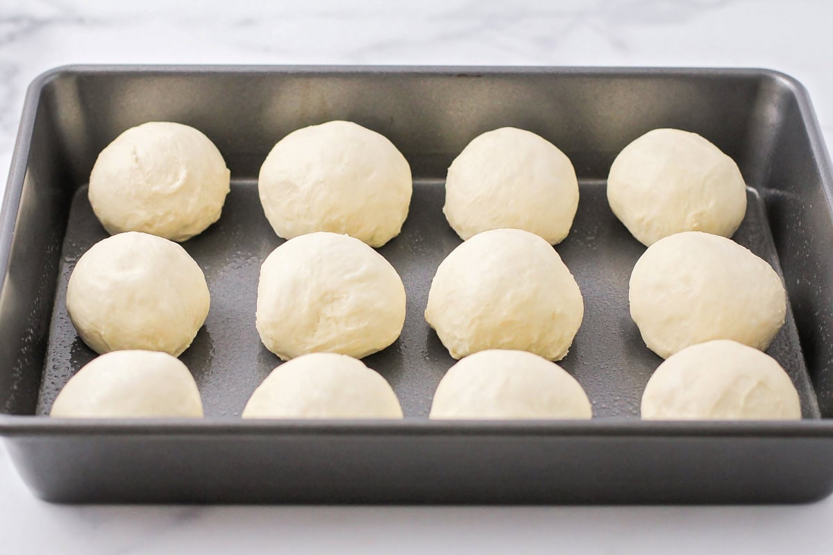 Dough ball in a baking dish.