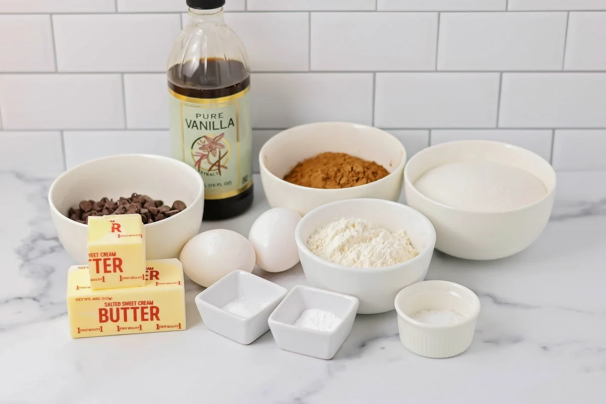 Brookies are the ultimate dessert mash-up, combining fudgy chewy brownies with gooey chocolate chip cookies for a truly irresistible treat! Brookies brownie batter ingredients on a kitchen counter.